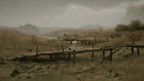 old wooden bridge over a swampy river in fog