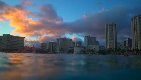 waikiki beach during sunset filmed from the ocean, honolulu hawaii