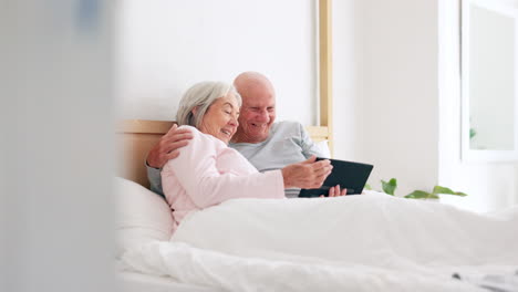 Senior,-happy-couple-and-together-with-tablet