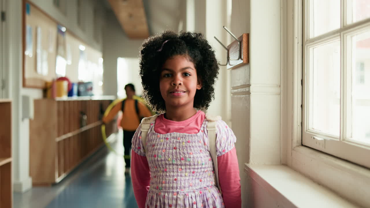 Young girl in a school hallway