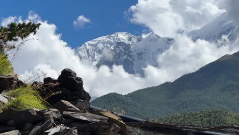 view of snow-capped annapurna mountain range from jomsom nepal - pan reveal