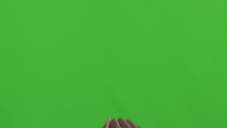 raised fist on green screen