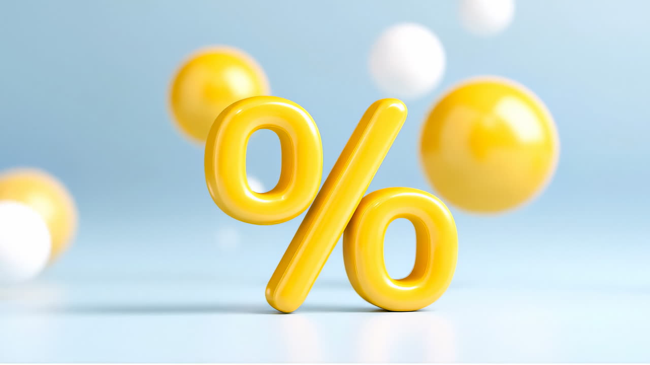 Yellow % symbol with spheres. A bright yellow percent symbol contrasts a soft blue background, surrounded by colorful floating spheres