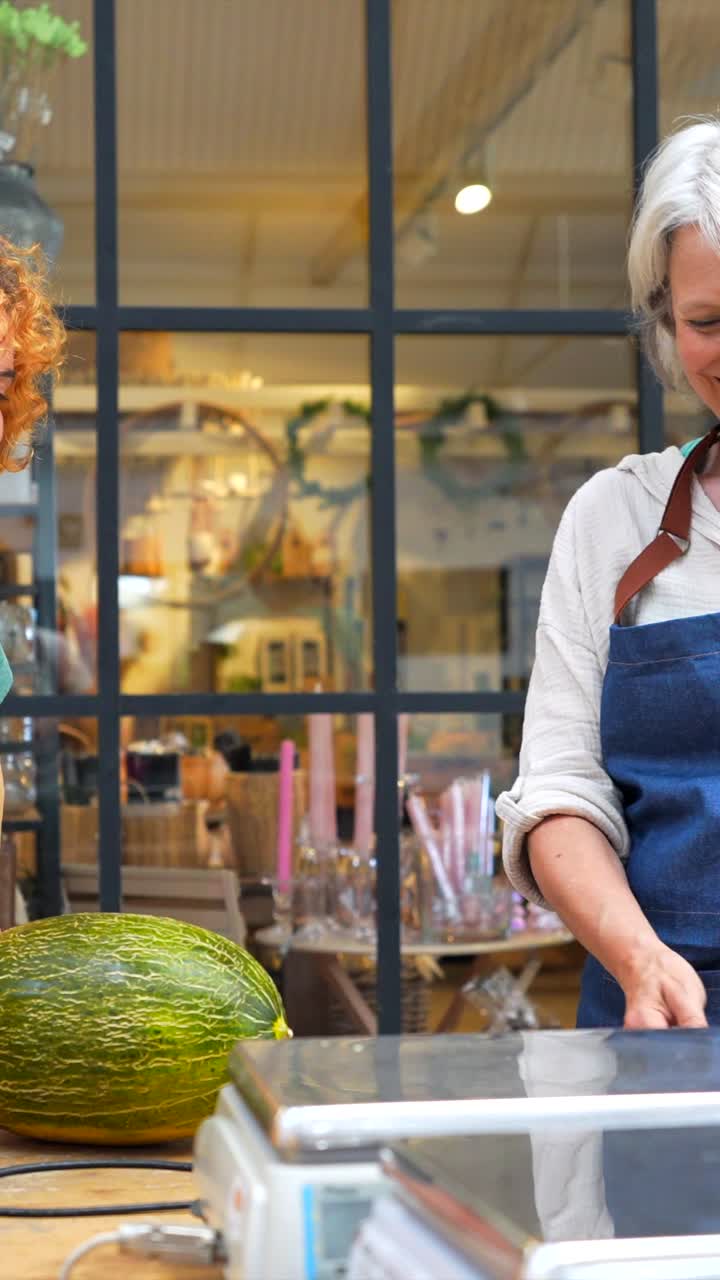 Woman selling melon at market