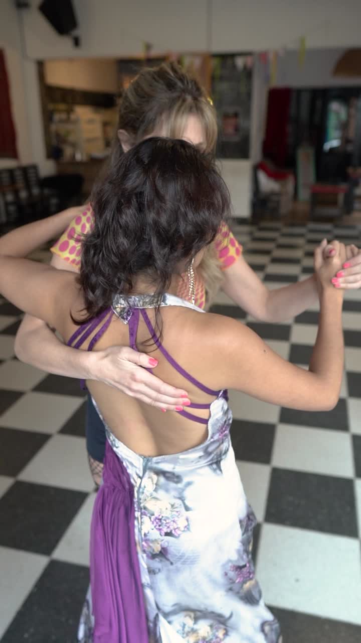 Romantic lesbian couple dancing together with passion and harmony. Their graceful movements convey a deep and joyful connection