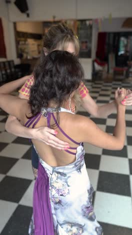 romantic lesbian couple dancing together with passion and harmony. their graceful movements convey a deep and joyful connection
