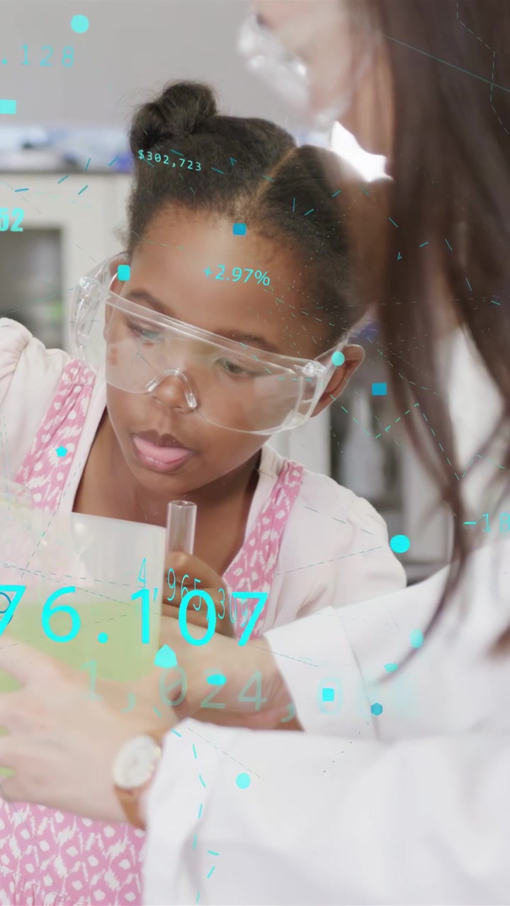 Vertical video: Kid dipping tube while mentor guiding hand, teaching, turquoise overlay over beaker