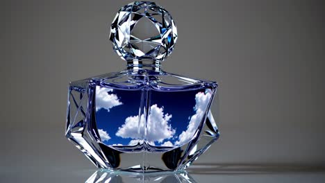 luxury crystal perfume bottle with sky reflection