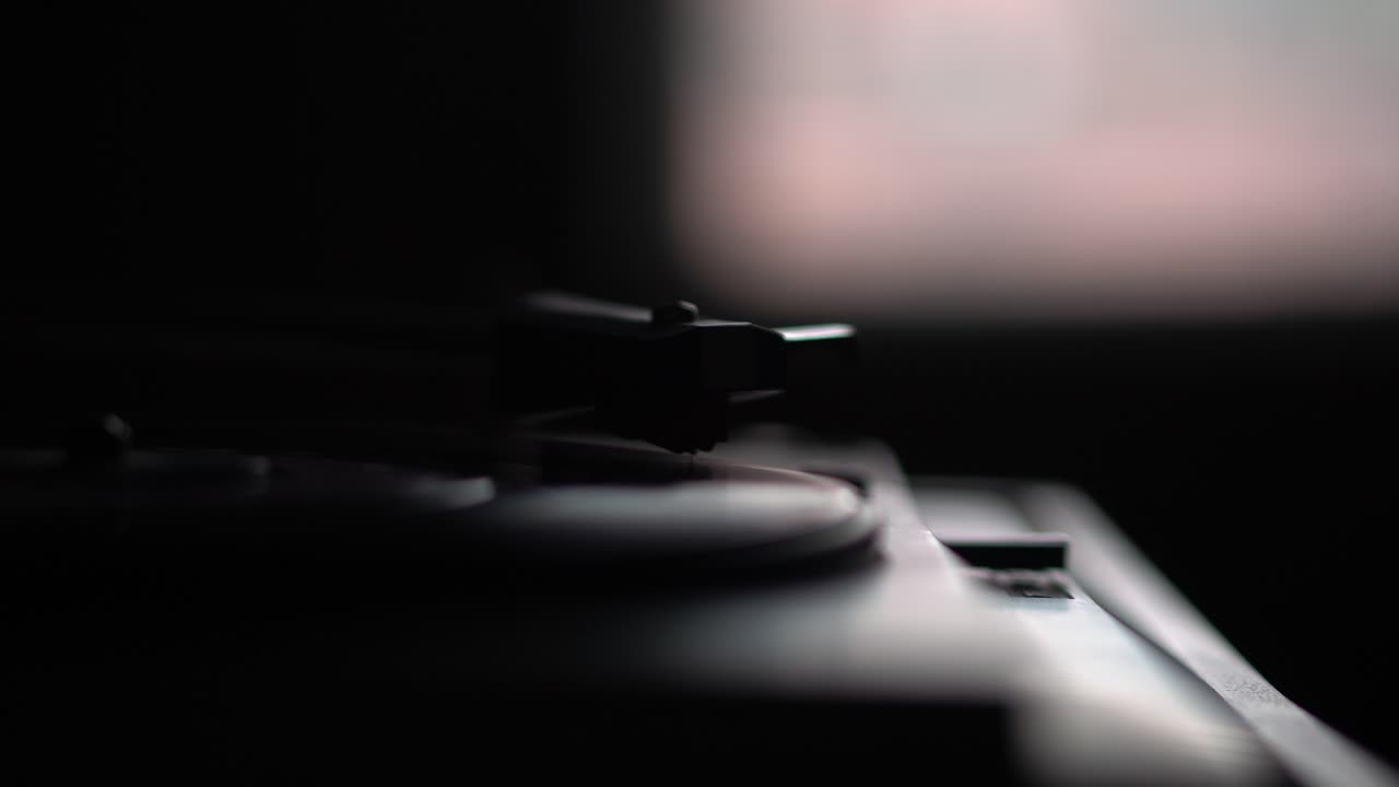 Starting Vintage Gramophone and Vinyl Record in Dark Room Ambience, Close Up