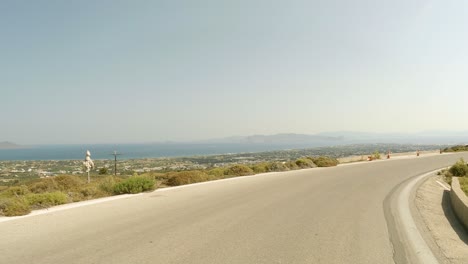 driving on the mountainside road in kos greek island during summer in greece