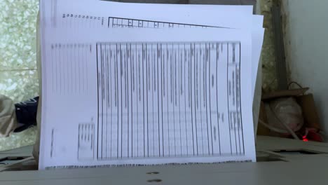 printed paper that comes out of the photocopier