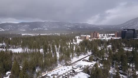 aerial panning shot of lake tahoe nevada california usa during the snowy season