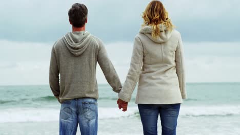 mature couple enjoying on beach