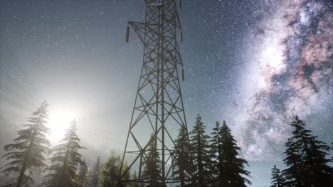 líneas eléctricas de alta tensión en el fondo del cielo estrellado