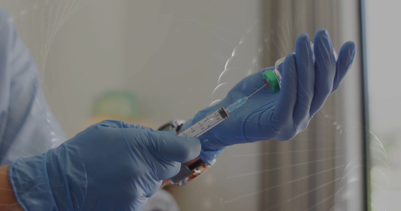 Clinician gloved hands inserting syringe in vial drawing dose aligning marks prepping medical shot
