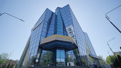 modern glass building with reflective facade