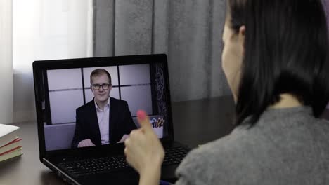 business woman make video chat call with boss on laptop. distance conference