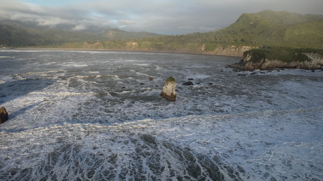 Foamy Waves At Rapahoe Beach In South Island, New Zealand. - aerial shot