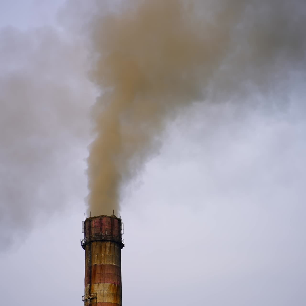 Tube emits harmful emissions. Industrial pipe polluting the environment. Pipe factory from which the chemical smoke comes