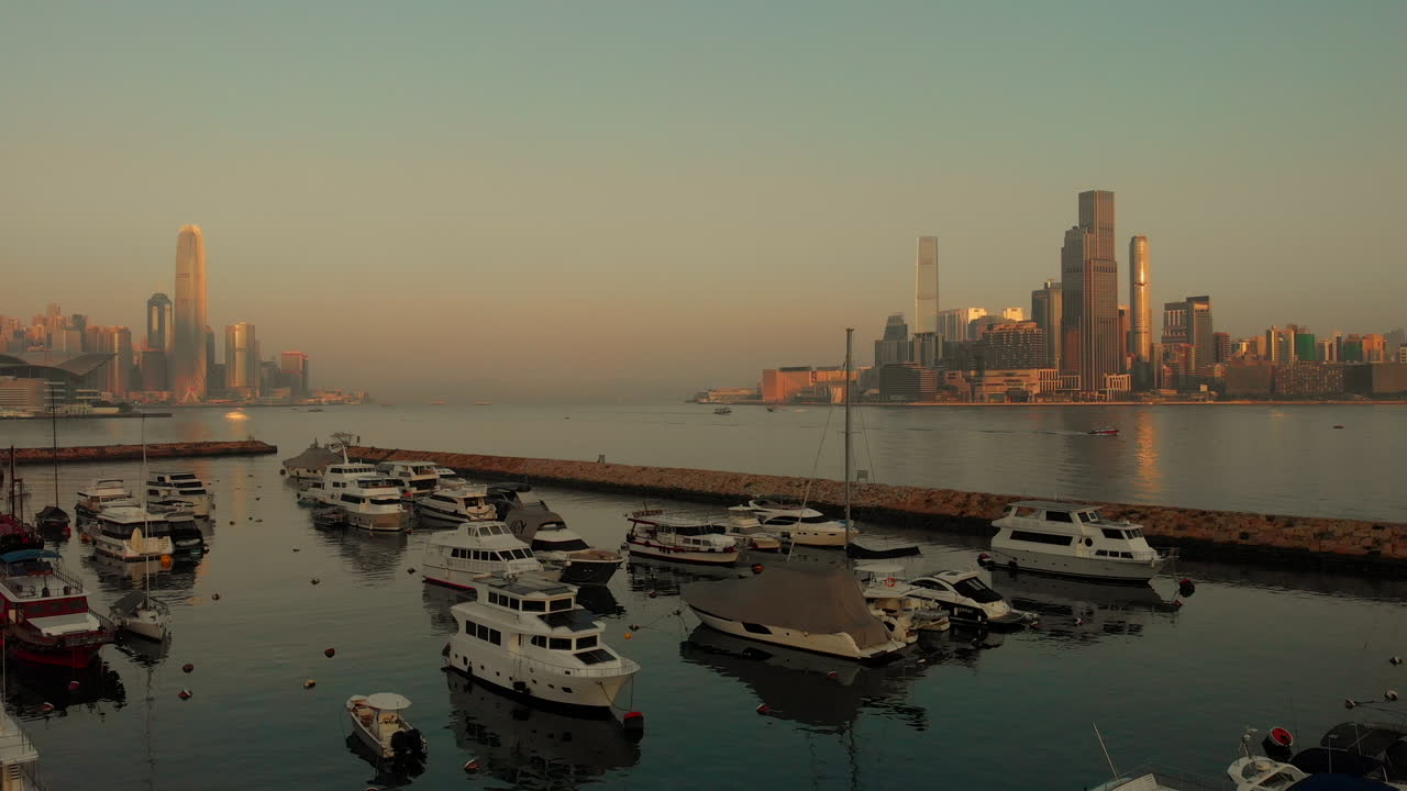 Aerial Dolly Drone shot of Hong Kong harbour, two coastlines visible