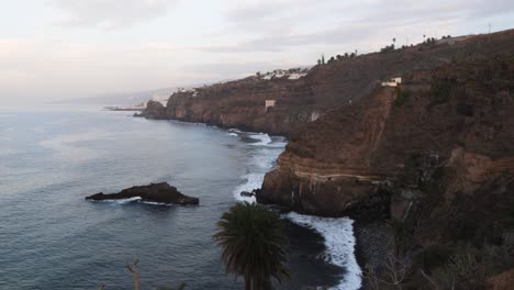 View-of-the-beautiful-cliffs-with-sea-waves-coming-to-the-shoreline-during-the-evening