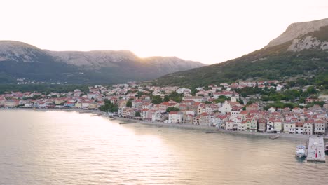 Aerial-boom-shot-of-a-quiet-village-on-Krk-Island-Croatia-early-in-the-morning
