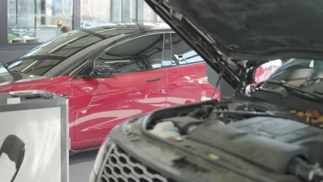 cars undergoing maintenance in auto repair shop