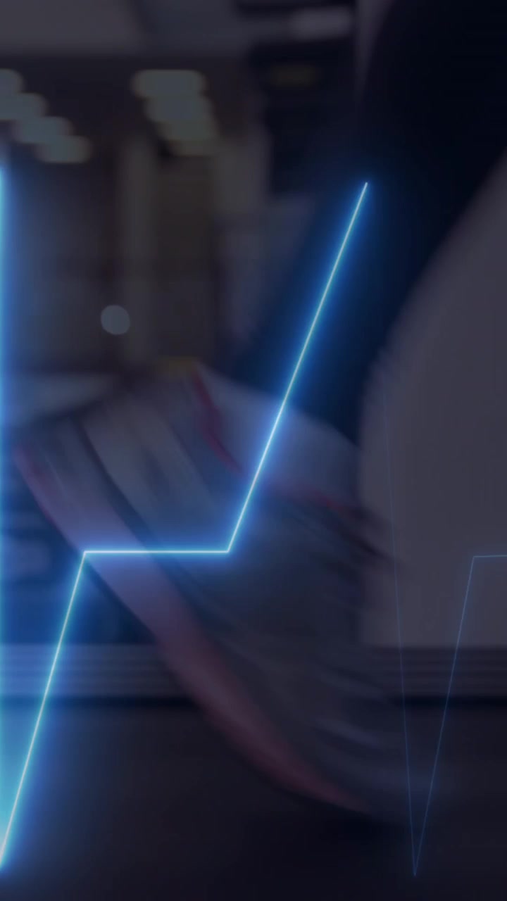 Animation of cardiograph over sports people exercising