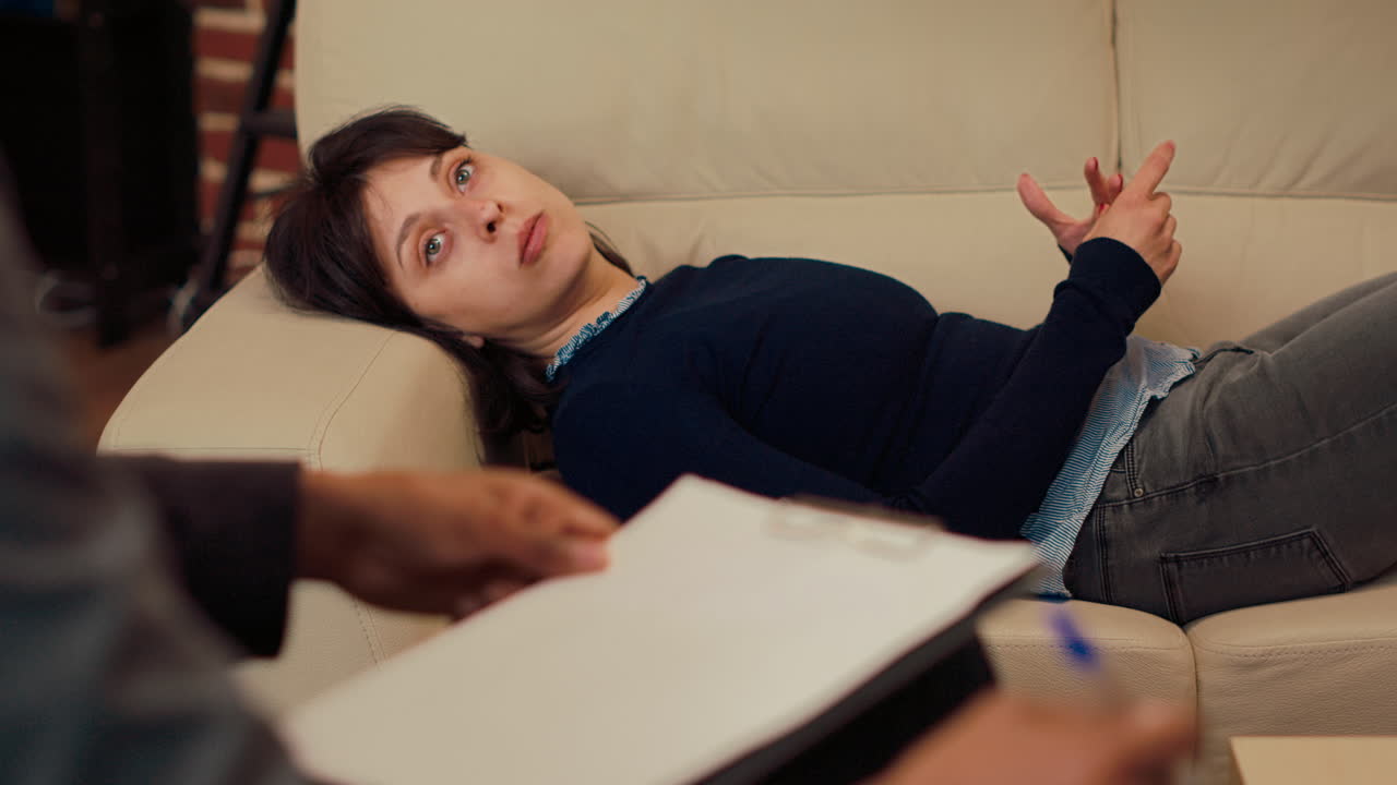 Unhappy person talking to counselor about marriage