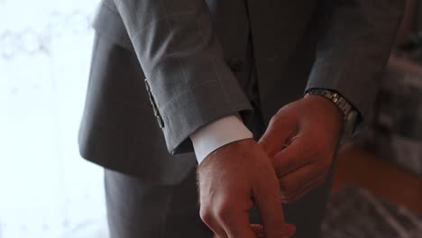 groom's preparing himself for his wedding