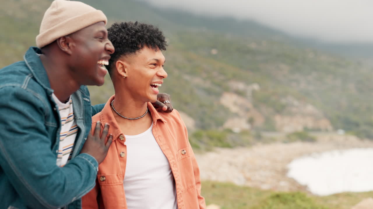 Two Men Enjoying the View of the Ocean