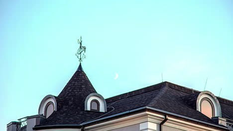 modern dark grey roof of high end house with clear blue sky