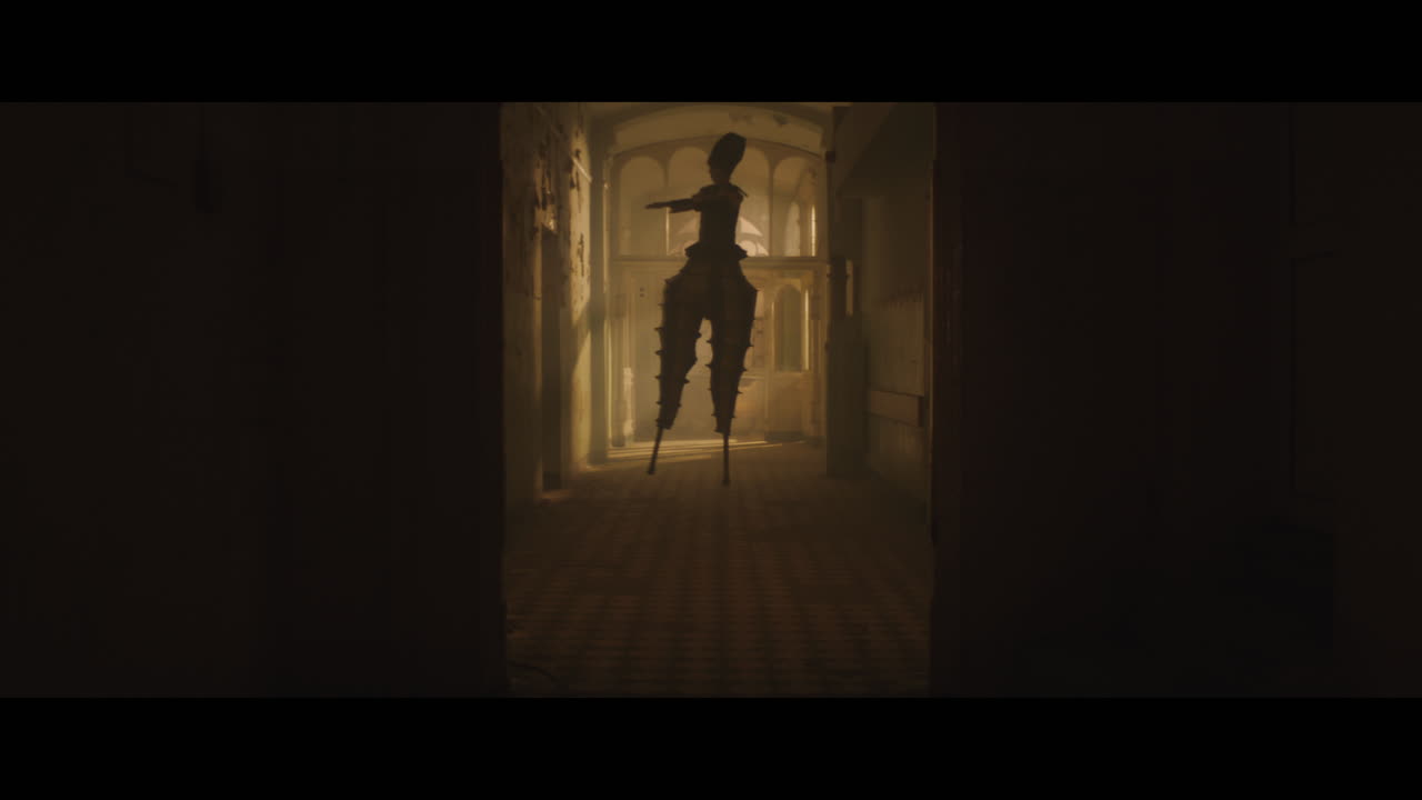 A strange clown on stilts in a dark corridor at night