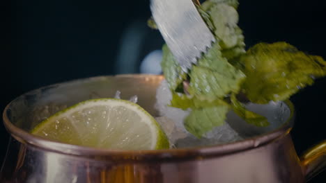 bartender preparing a cocktail . close up