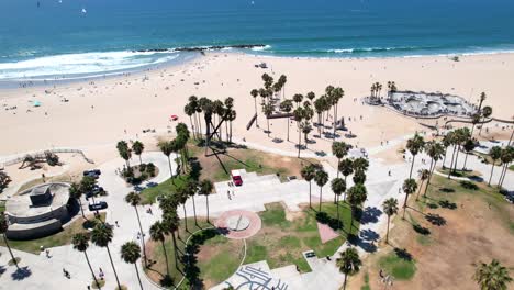 aerial tracking shot of venice beach skatepark where olympics 2028 will take place, california