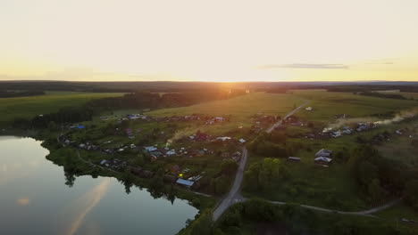 aerial view of a russian village at sunset