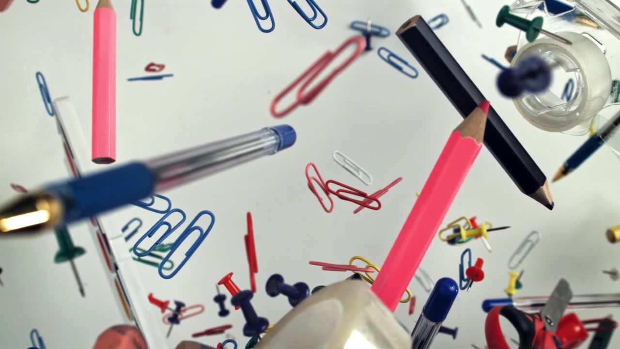 Colorful Office and School Supplies Floating in Slow Motion
