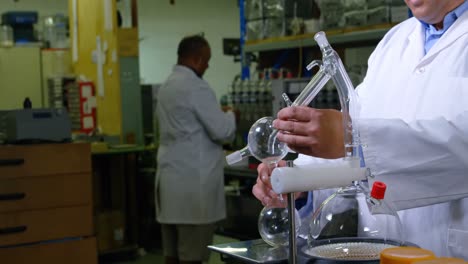 mid section of worker working in glass factory 4k