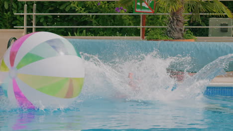 young man splash water in pool 3