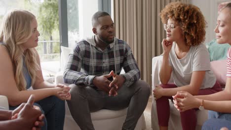 diverse friends talking at group therapy, slow motion