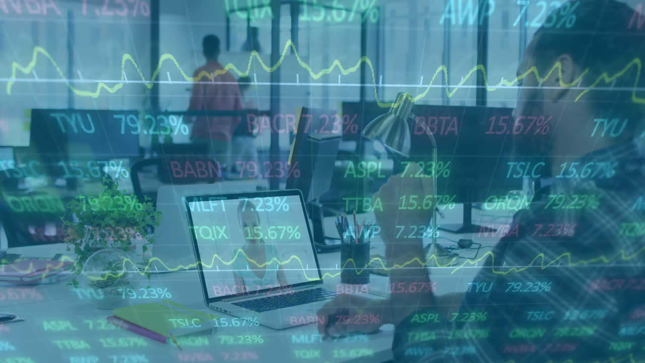 In office, animation of financial data and stock market graphs overlaying workspace