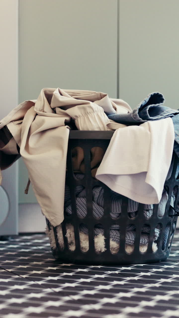 Laundry basket filled with clothes