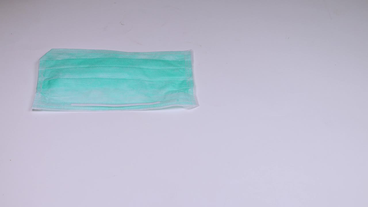 Stop motion health mask WHITE  background, concept for protection corona virus covid-19