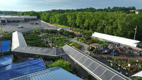 invernadero al aire libre para la venta de arbustos de flores