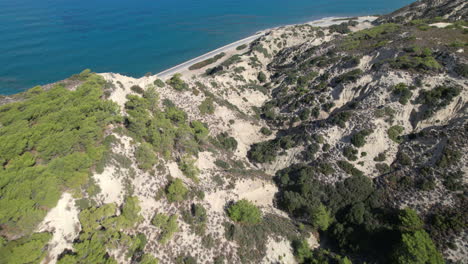 a serene coastal paradise in greece with crystal clear waters and sandy shores