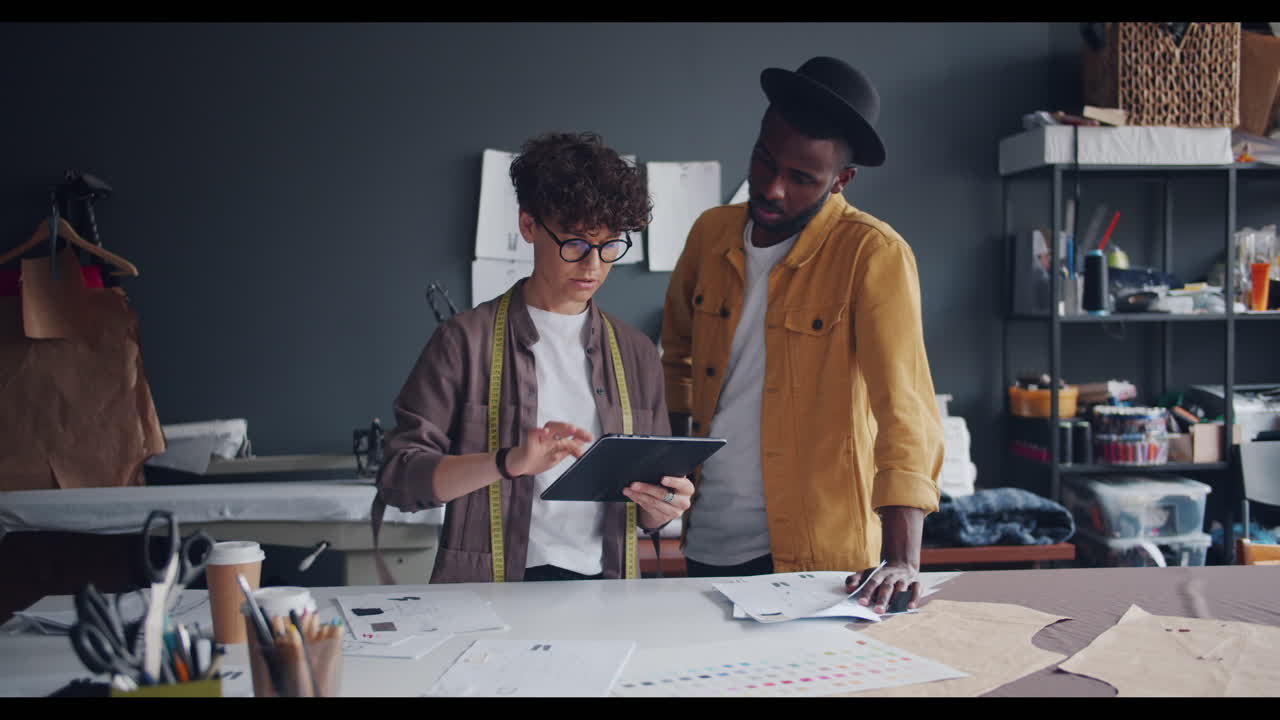 Fashion Designers Collaborating on Digital Design Project