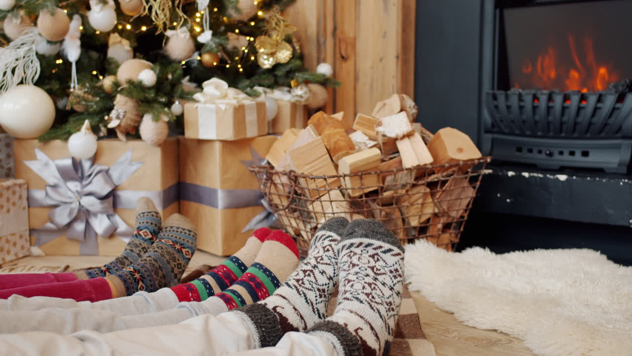 Family Relaxing by the Fireplace on Christmas