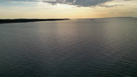 Kayaking-on-a-calm-sea-with-the-sun-setting