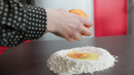 grate sicilian orange zest into homemade easter cake dough