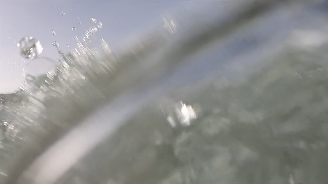 Man wearing swimming googles diving in the sea